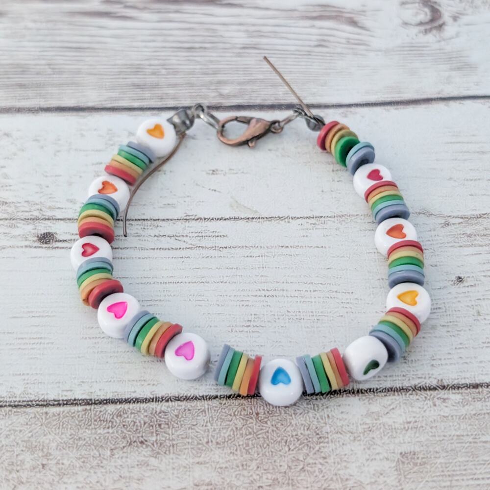 Stretchy Clasp Bracelet with Heart Design Beads - Condition Issues
